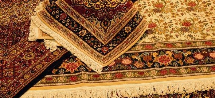 what determines the cost of handmade carpet when buying one?